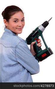 Woman holding a screwdriver
