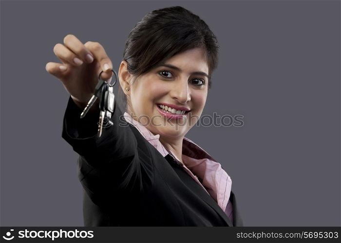 Woman holding a set of keys