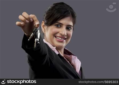 Woman holding a set of keys