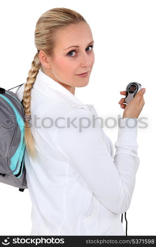 woman holding a stopwatch