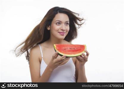 Woman holding a watermelon