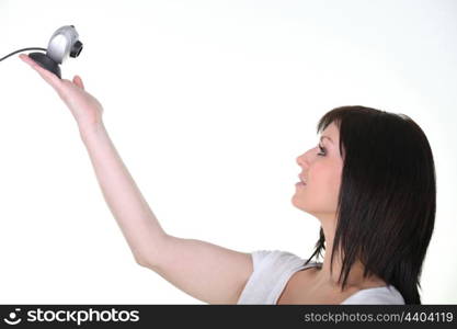 Woman holding a webcam