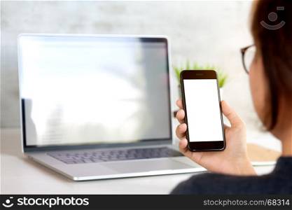 woman holding and looking on phone mobile white screen