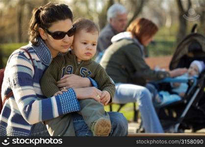 Woman holding baby on lap