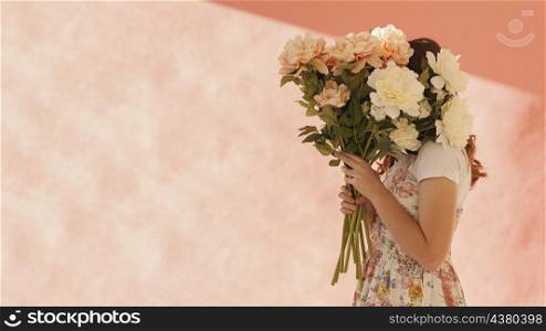 woman holding beautiful flowers