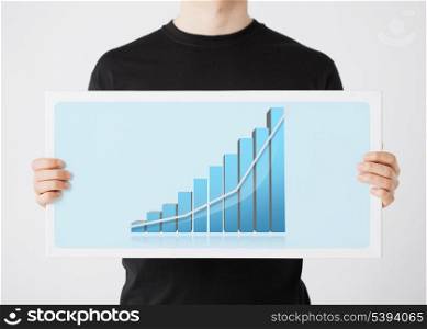 woman holding big board with 3d graph