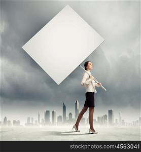 Woman holding blank board. Image of attractive woman holding blank board. Place for text