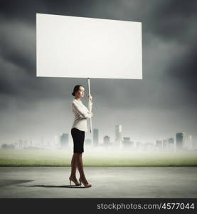 Woman holding blank board. Image of attractive woman holding blank board. Place for text