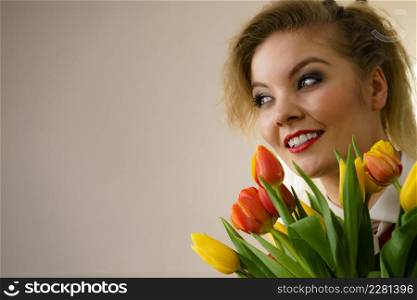Woman holding bouquet of tulips flowers gift. Womans day, 8 march present.. Woman holding bouquet of tulips flowers