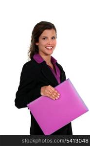 Woman holding bright pink folder