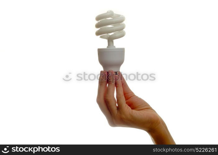 Woman holding bulb over white background