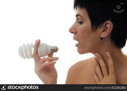 Woman holding bulb over white background