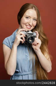 woman holding camera