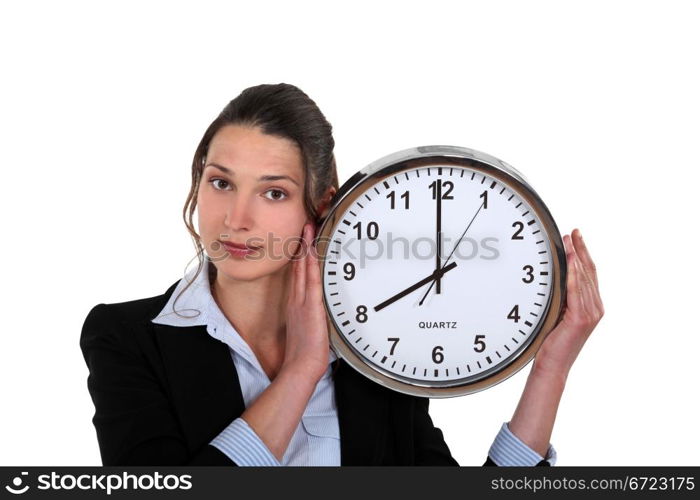 Woman holding clock
