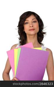 Woman holding files