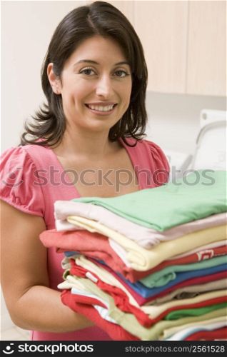 Woman Holding Fresh Laundry