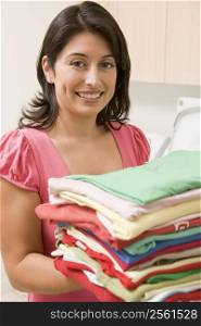 Woman Holding Fresh Laundry