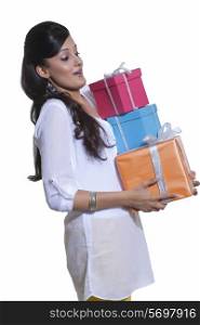 Woman holding gift boxes