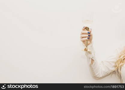 woman holding glass champagne. Resolution and high quality beautiful photo. woman holding glass champagne. High quality and resolution beautiful photo concept