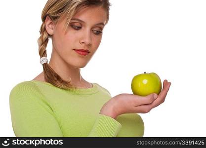 Woman holding green apple on white background