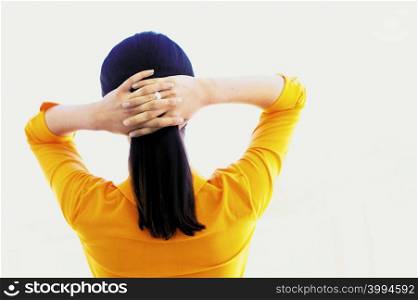 Woman holding hair