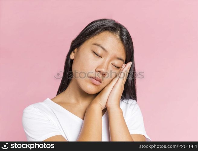 woman holding her hands sleep