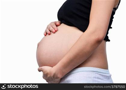 Woman holding her pregnant belly. White background.
