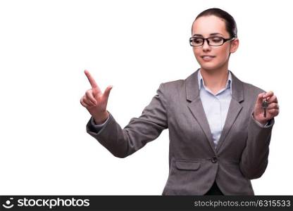 Woman holding keys in real estate concept
