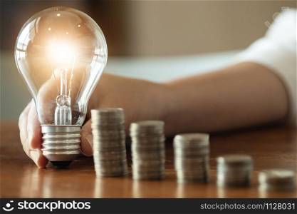 Woman holding light bulb Idea creativity concept.