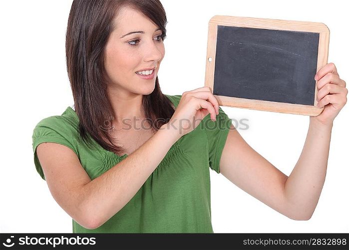 Woman holding miniature chalkboard