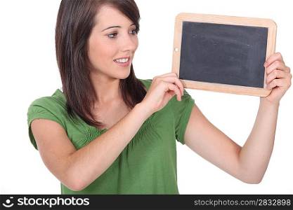 Woman holding miniature chalkboard