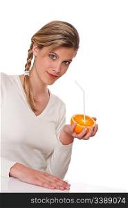 Woman holding orange on white background