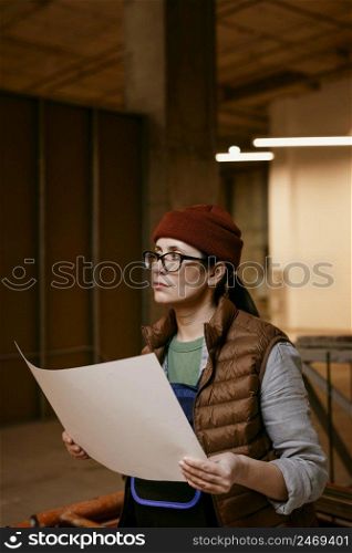 woman holding paper