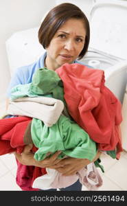 Woman Holding Pile Of Laundry