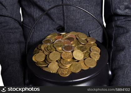 Woman holding pot of gold coins