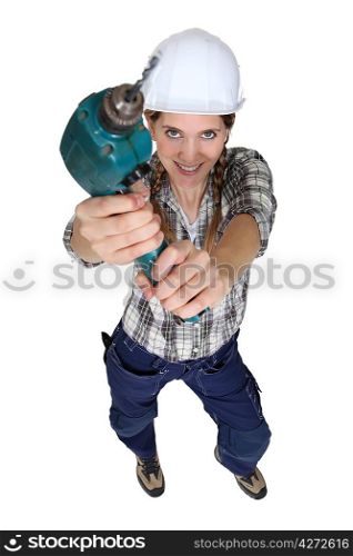 Woman holding power drill