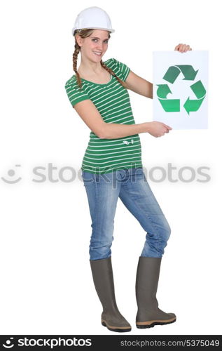 Woman holding recycle logo