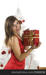 Woman holding red chistmas gift