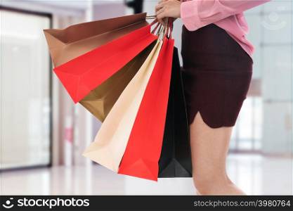 woman holding shopping bag at the mall
