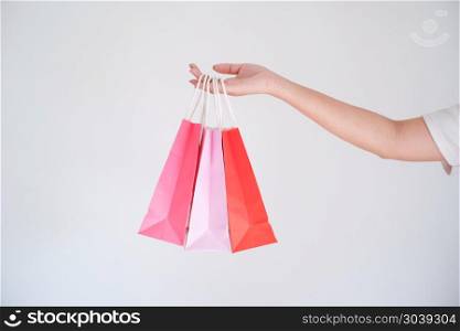 woman holding shopping bag. woman holding shopping bag.