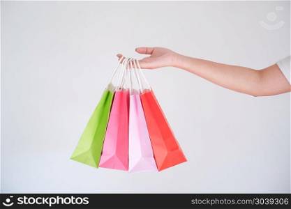 woman holding shopping bag. woman holding shopping bag.
