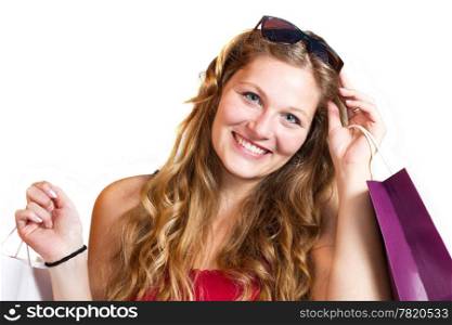 woman holding shopping bags against white background