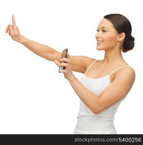 woman holding smartphone and working with something imaginary
