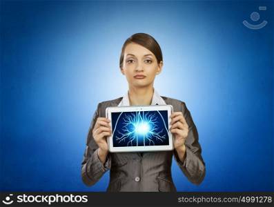 Woman holding tablet pc with brain concept. Mental ability