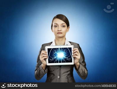 Woman holding tablet pc with brain concept. Mental ability