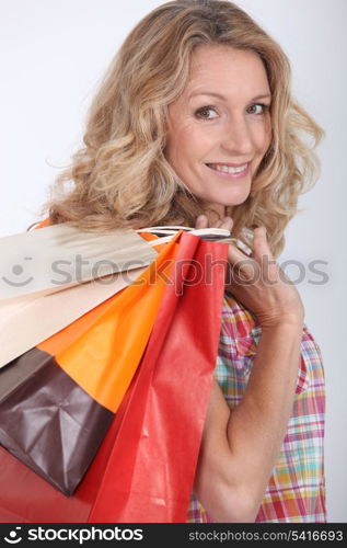 Woman holding two shopping bags