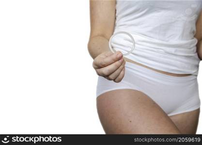 Woman Holding Vaginal Ring For Contraceptive Use isolated on white background, space for text. Woman Holding Vaginal Ring For Contraceptive Use isolated on white background,