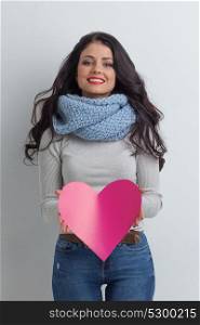 Woman holding Valentines Day heart. Valentines Day. Woman holding Valentines Day paper heart with copy space