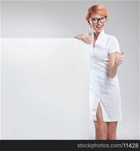 Woman holding white shape blank for copy.