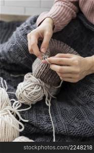 woman home knitting close up 3. woman home knitting close up 2